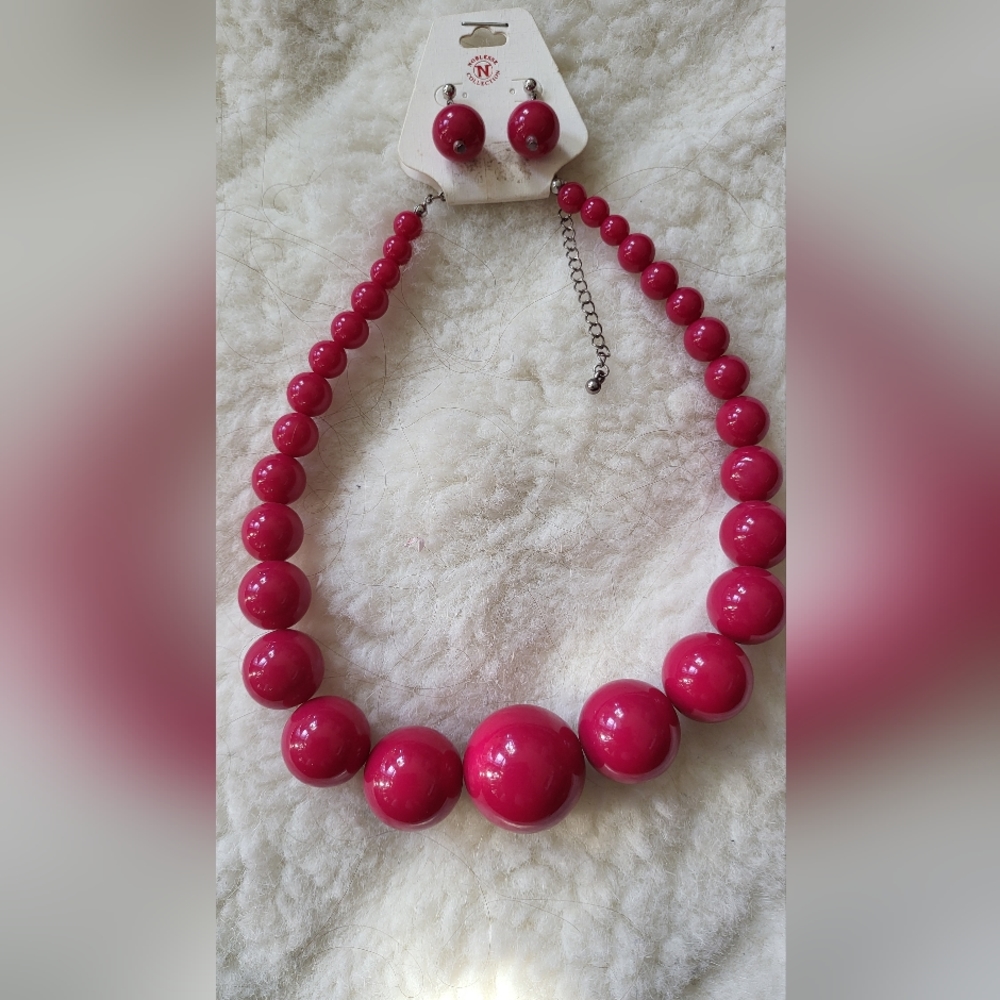 Hot Pink graduated bead necklace with matching dangle earrings.